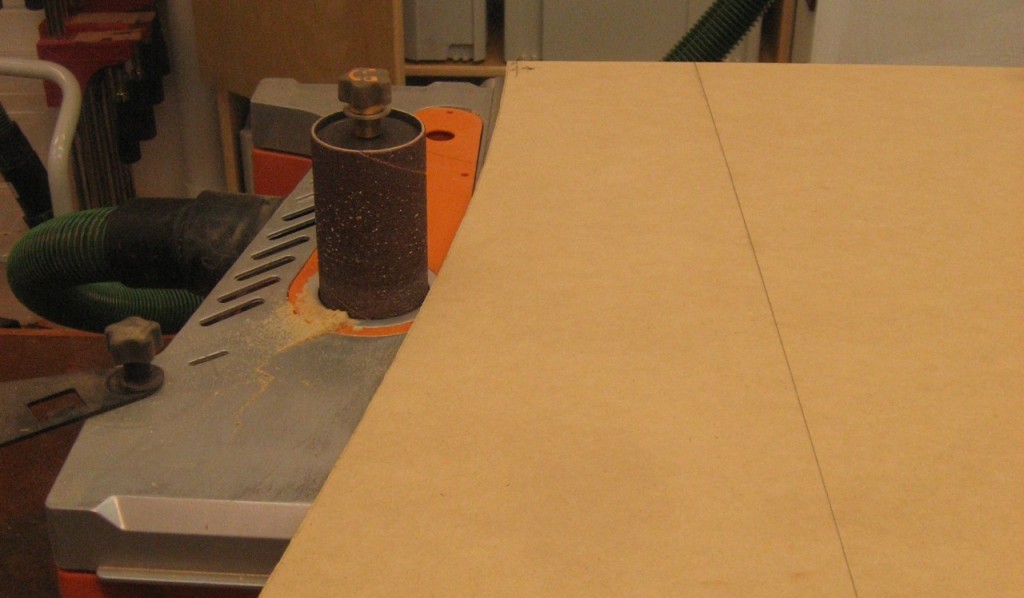 A spindle sander cleans up the edge