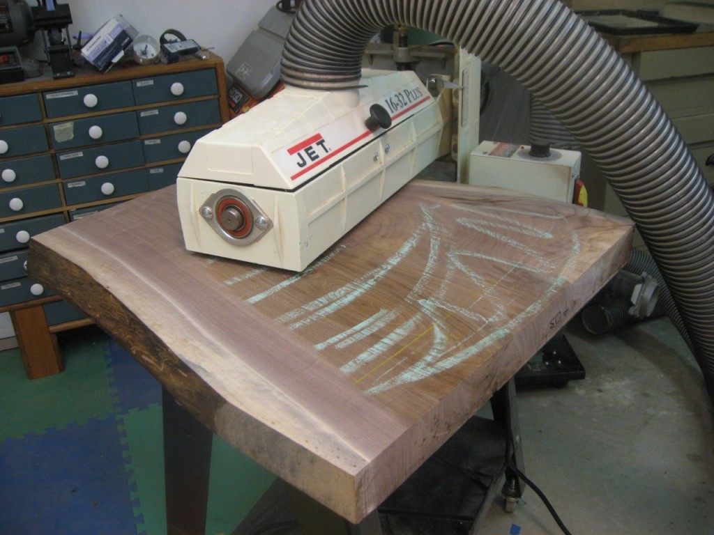 An open-ended Jet drum sander is used to flatten the other side