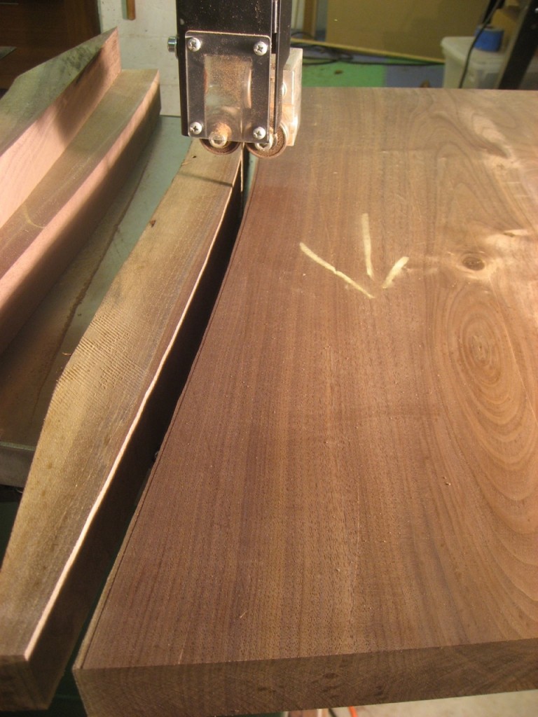 I use the bandsaw to cut within 1/16" of the curve line.