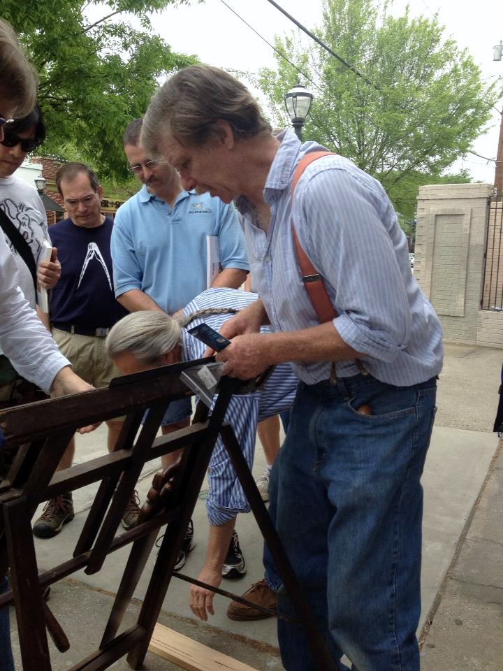 Later in the day, Roy moved outside to demonstrate sharpening to passersby