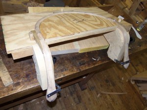 Here is the arm completely secure on the bending form.  After a few days on the form, the arm will be dry and ready to be joined up to the soon to be created seat.