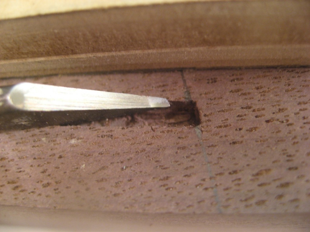 Testing out a very small chisel to square a 3/32" groove.