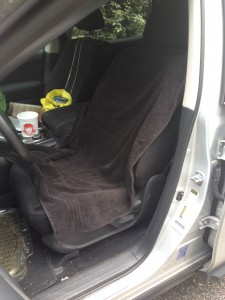 The only thing worse than being unable to clean the dirt out of your car’s upholstery is putting up with the sour smell because you sweated right down to the core of the driver’s seat. Protect the seat with one, or two or all three of your transport towels, depending on how sweaty you get.