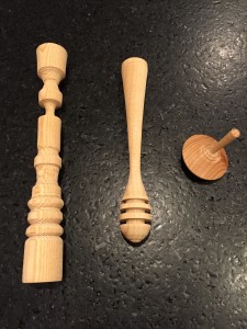 Completed honey dipper and top alongside practice piece