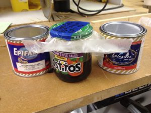 A salsa jar makes a good, splash-free, resealable finish-mixing container. A shallow jar like this can also be stirred with a credit-card ministrip.